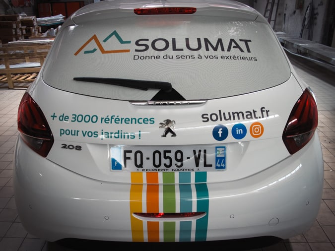 Film microperforé et covering posés sur une Peugeot 208