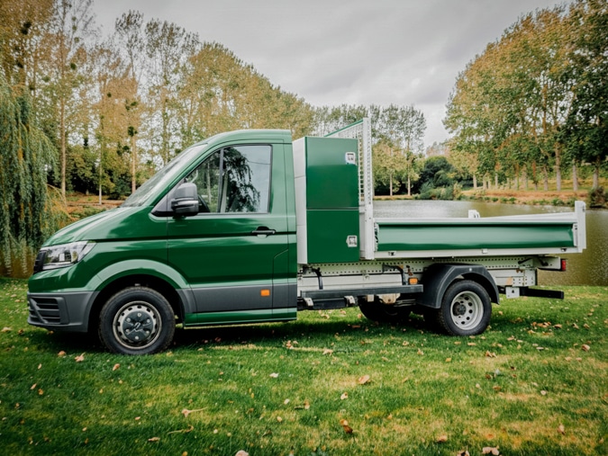 Covering d'un camion benne pour un professionnel dans le paysagisme.